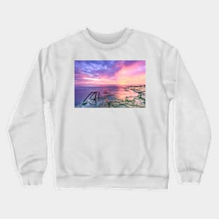 A sunset reflected in the sea Crewneck Sweatshirt